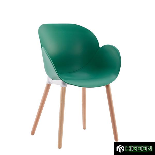 Beautiful plastic armchair with wood legs