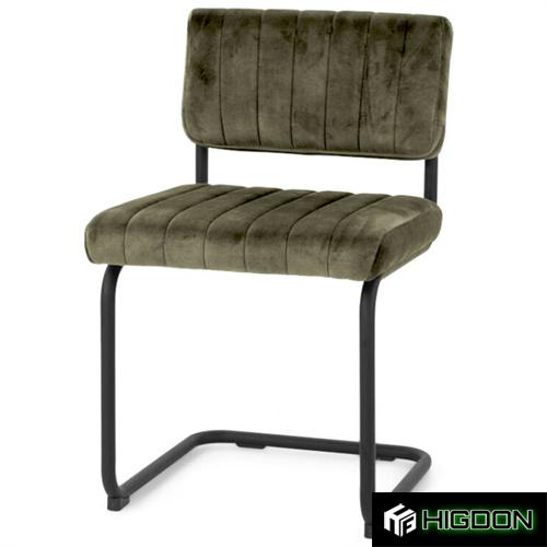 Olive velvet dining chair with metal end