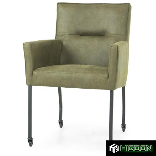 Green armrest dining chair on wheels