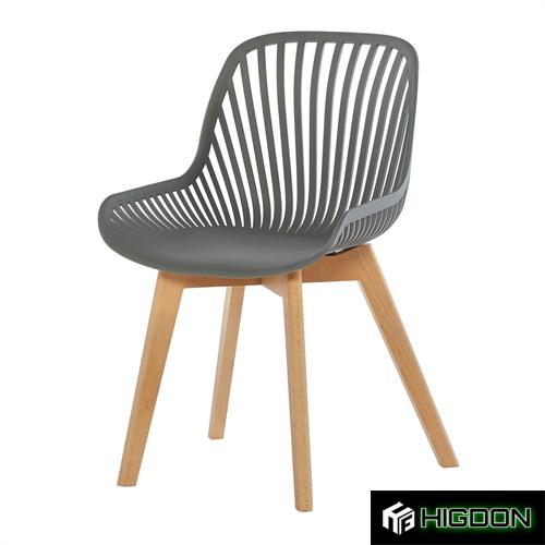 Grey plastic kitchen dining chair with wood feet