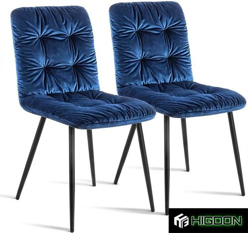 Armless navy blue velvet chair with metal feet