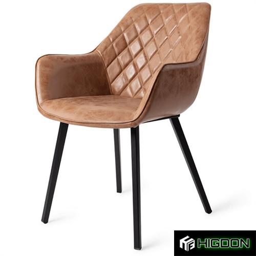 Luxurious brown upholstered armchair with metal feet