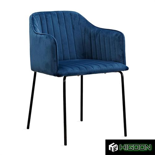 Luxurious and contemporary dark blue velvet dining armchair