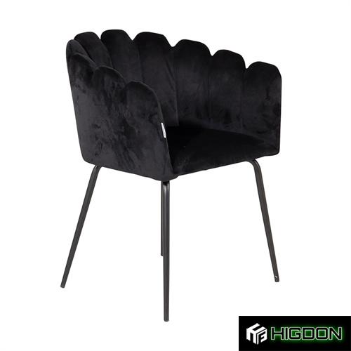 Black velvet dining armchair with metal feet