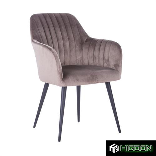 Comfortable velvet dining armchair with metal feet