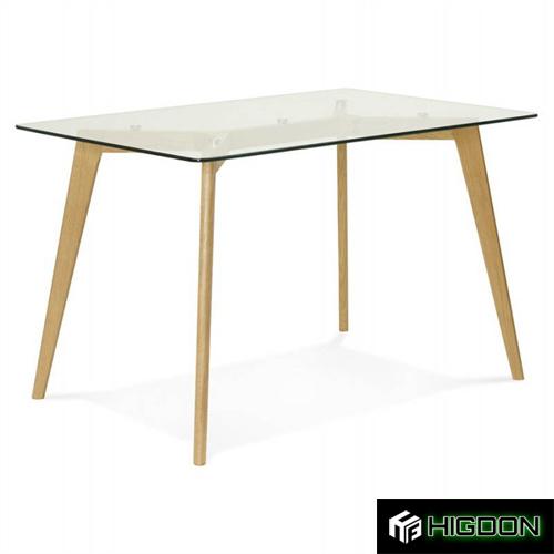 Exquisite rectangle dining table with a clear tempered glass top and wooden feet