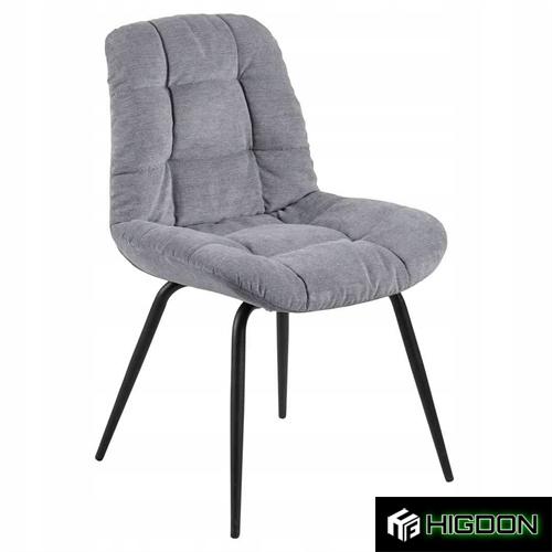 Grey upholstered dining chair with black metal feet 