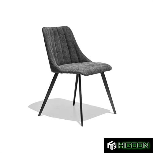 Dining chair in dark grey fabric with metal feet combines comfort