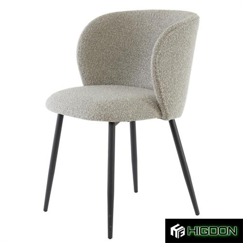 Curved back stylish grey boucle dining chair