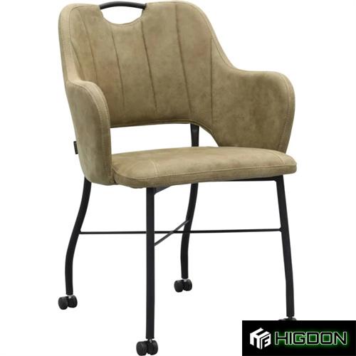 Taupe upholstered armchair on wheels