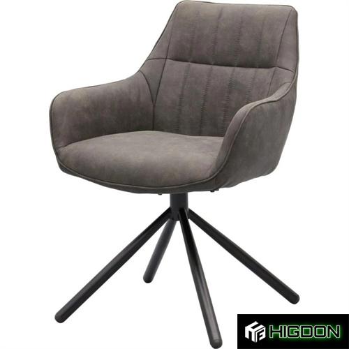 Rotatable dark grey upholstered armchair