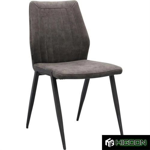 Dark grey upholstered dining chair with metal feet