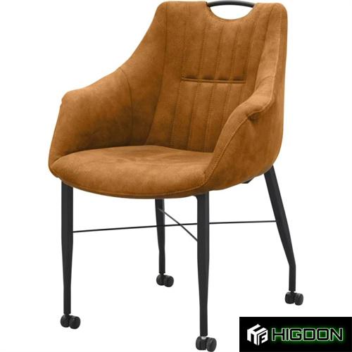 Stylish and versatile dining armchair on wheels,