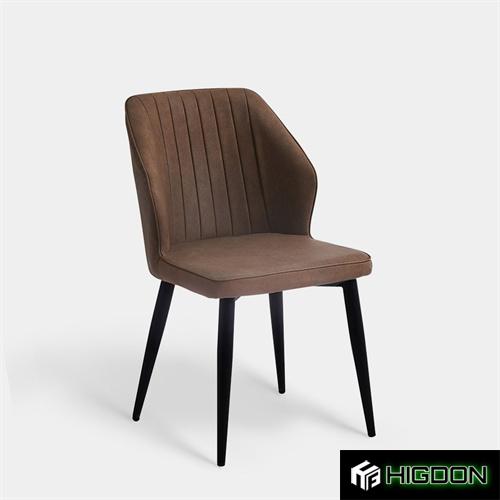 Curved back upholstered dining chair