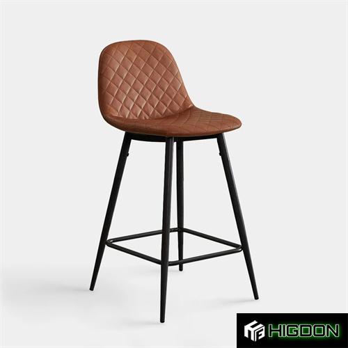 Stylish and comfortable upholstered bar stool with black metal feet