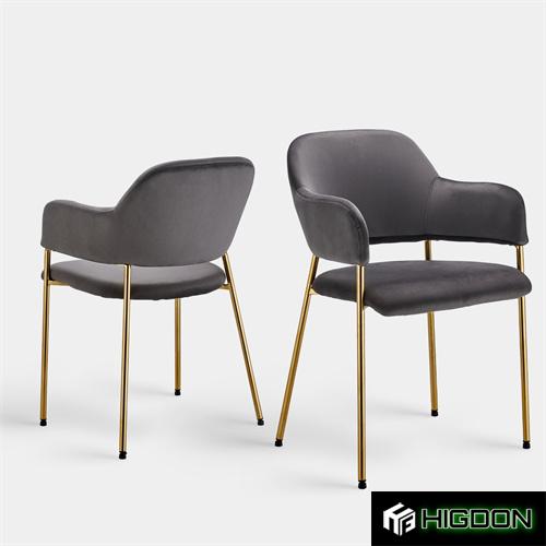 Luxury velvet armrest dining chair with golden metal legs